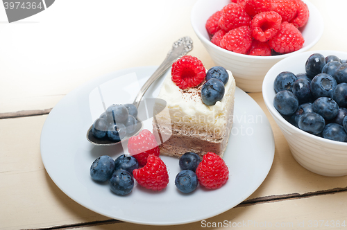 Image of fresh raspberry and blueberry cake