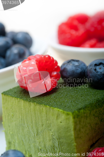 Image of green tea matcha mousse cake with berries