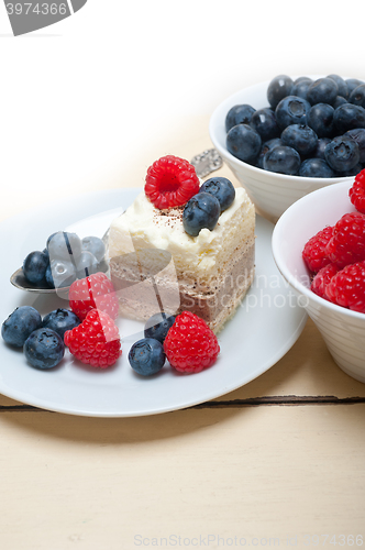 Image of fresh raspberry and blueberry cake