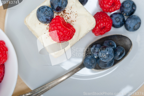 Image of fresh raspberry and blueberry cake