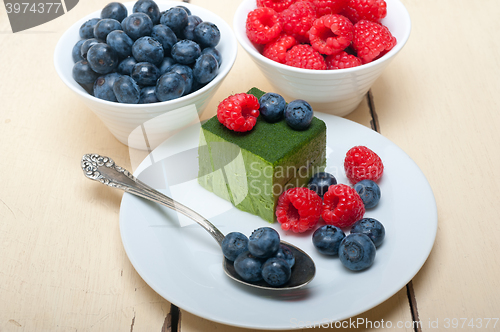 Image of green tea matcha mousse cake with berries