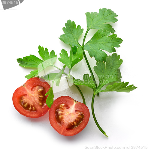 Image of fresh green parsley leaves and tomato