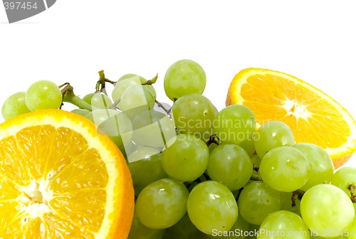 Image of grapes and two halves of orange