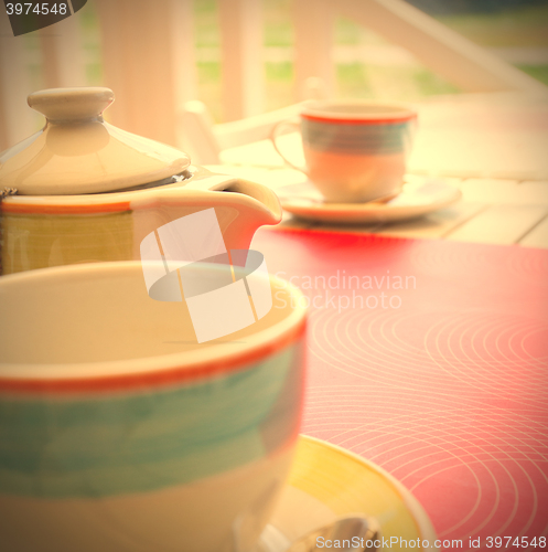 Image of cups and a teapot