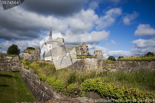 Image of ruins and a church