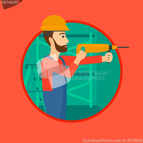 Image of Worker with hammer drill.