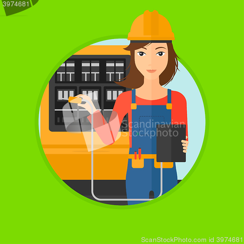 Image of Electrician with electrical equipment.