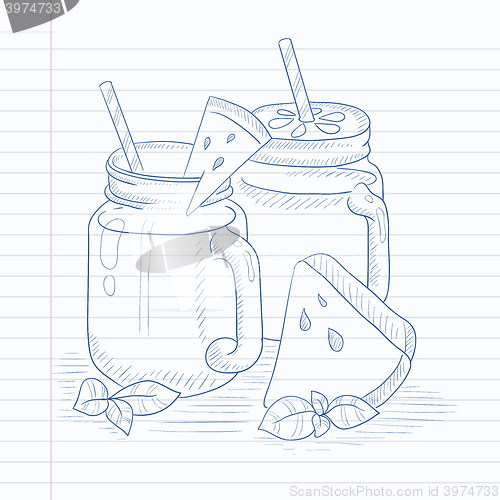 Image of Watermelon smoothie in mason jar.