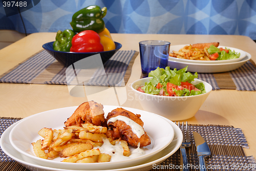 Image of French fries and chicken