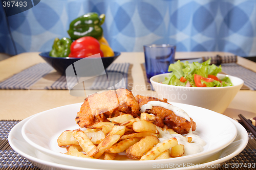 Image of French fries and chicken