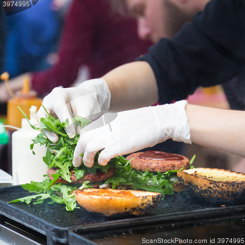 Image of Beef burgers ready to serve on food stall.