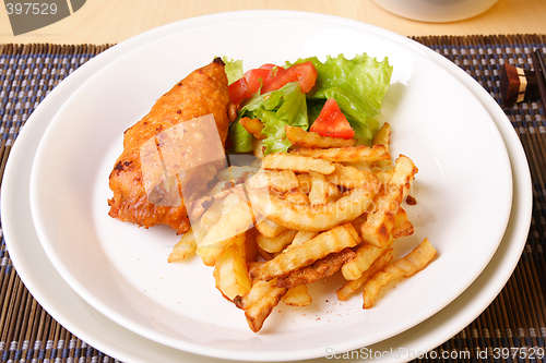 Image of French fries and chicken