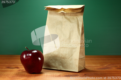 Image of A Back to School Lunch Sack and Apple