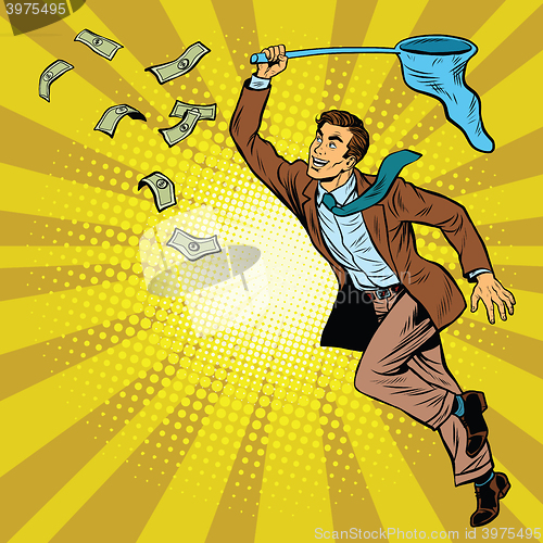 Image of Business man catching money with a butterfly net