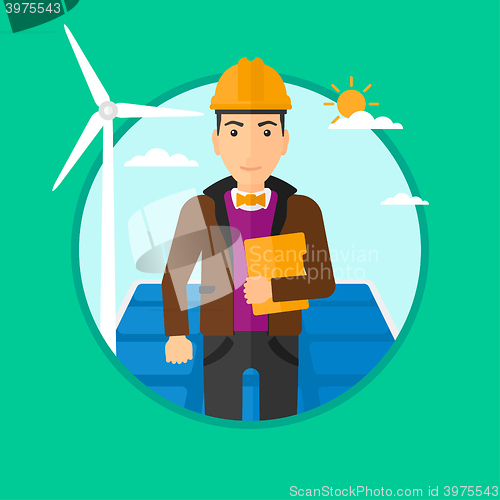 Image of Male worker of solar power plant and wind farm.