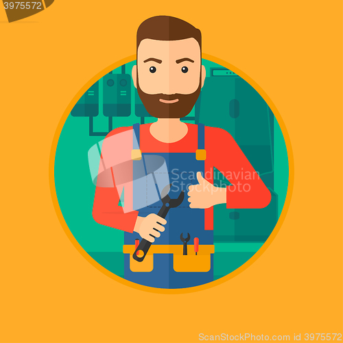 Image of Cheerful repairman with spanner.