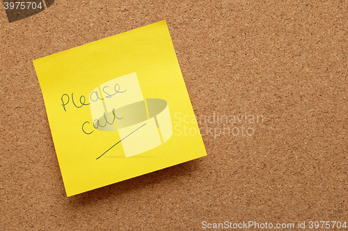 Image of Yellow sticky note - Please Call - on cork board