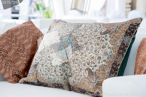 Image of pillows with a Arabic pattern