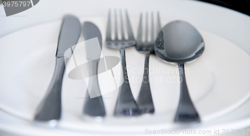 Image of Fork, Spoon and Table Knife on the white background