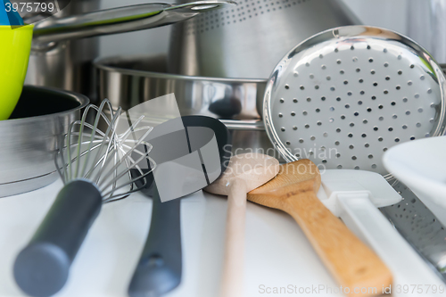 Image of Various tableware on shelf in the kitchen