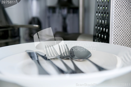 Image of Fork, Spoon and Table Knife on the white background