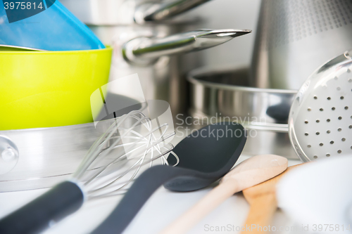 Image of Various tableware on shelf in the kitchen