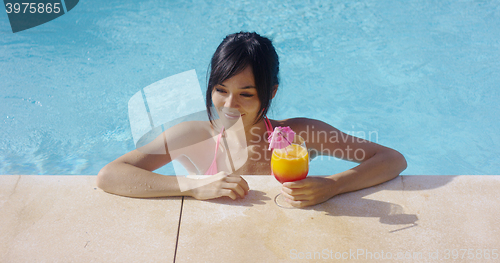 Image of Thoughtful young woman at a summer resort