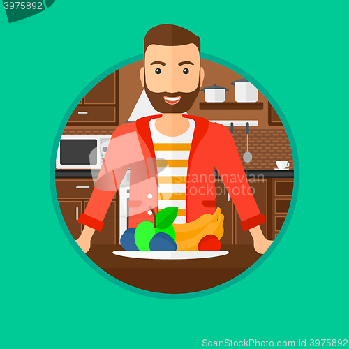 Image of Man with fresh fruits.
