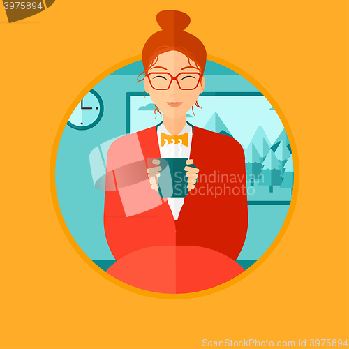 Image of Woman drinking coffee or tea.