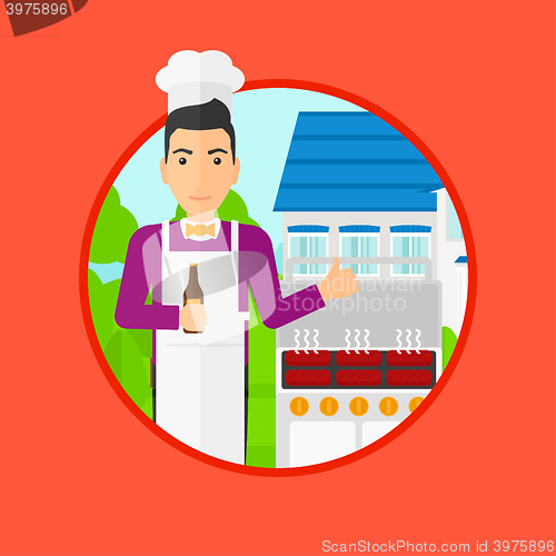 Image of Man cooking meat on gas barbecue grill.