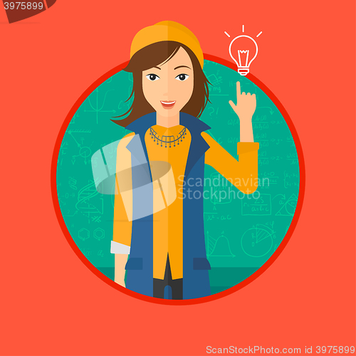 Image of Woman pointing at light bulb.