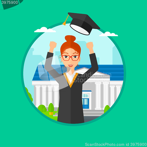 Image of Graduate throwing up her hat.