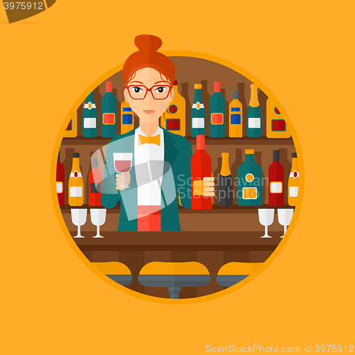 Image of Bartender standing at the bar counter.