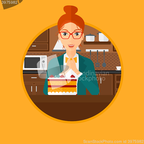 Image of Woman looking at cake with temptation.