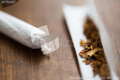 Image of close up of marijuana joint and tobacco