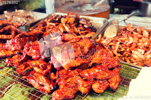 Image of meat grill at street market