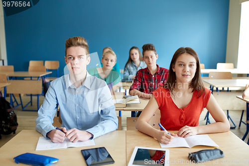 Image of students with notebooks and tablet pc at school