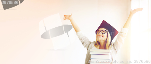 Image of happy student in graduation cap