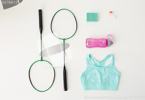 Image of close up of badminton rackets with sports stuff