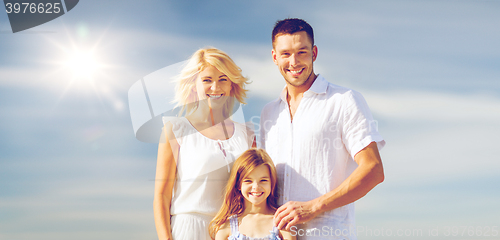 Image of happy family with blue sky