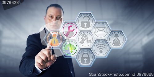 Image of Businessman Activating Managed Services Icons