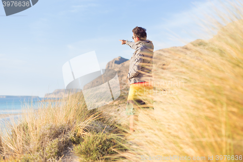 Image of Free active man enjoying beauty of nature.