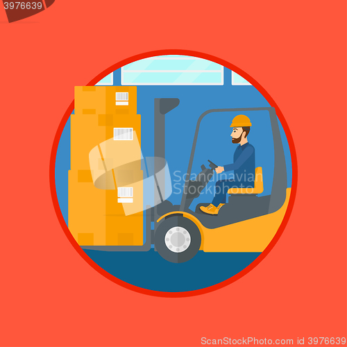 Image of Warehouse worker moving load by forklift truck.