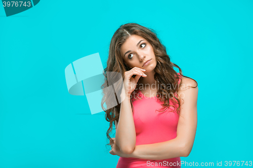 Image of The young woman\'s portrait with thoughtful emotions