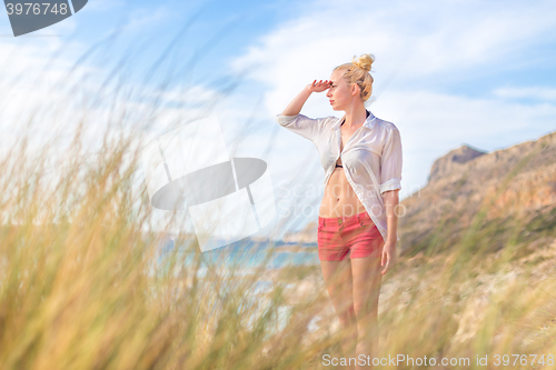 Image of Free Happy Woman Enjoying Sun on Vacations.