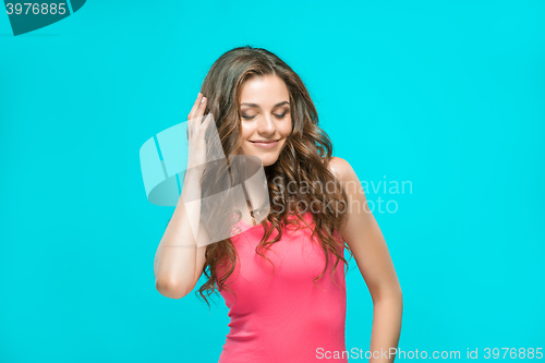 Image of The young woman\'s portrait with happy emotions