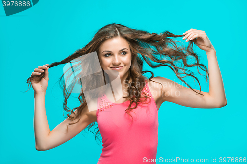 Image of The young woman\'s portrait with happy emotions