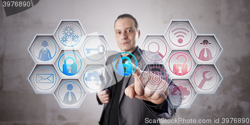 Image of Businessman Closing A Lock To Secure Information