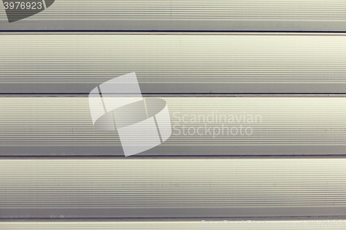 Image of close up of aluminum metal garage door backdrop