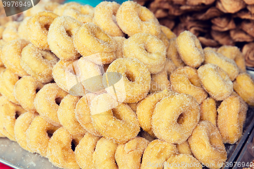 Image of sugared donuts at asian street market